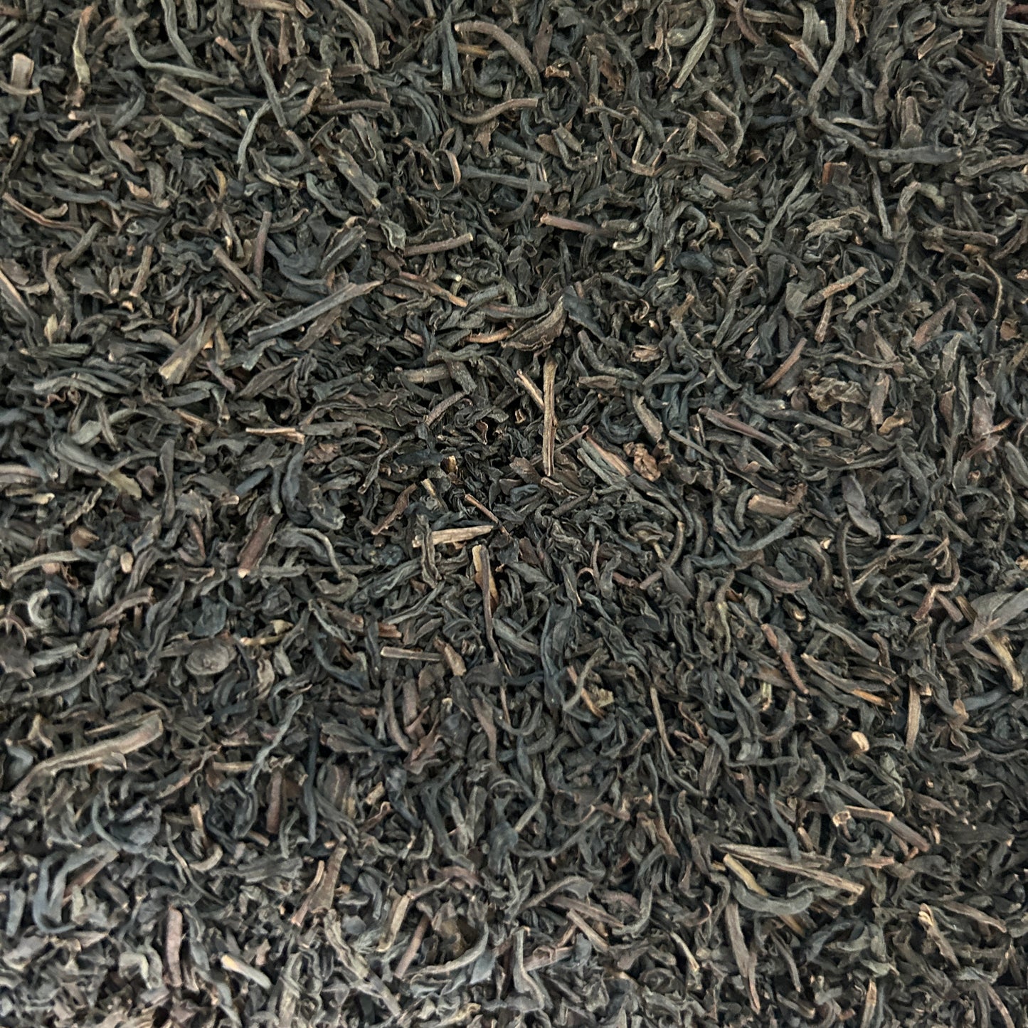 Loose leaf decaffeinated black tea with smooth dark leaves