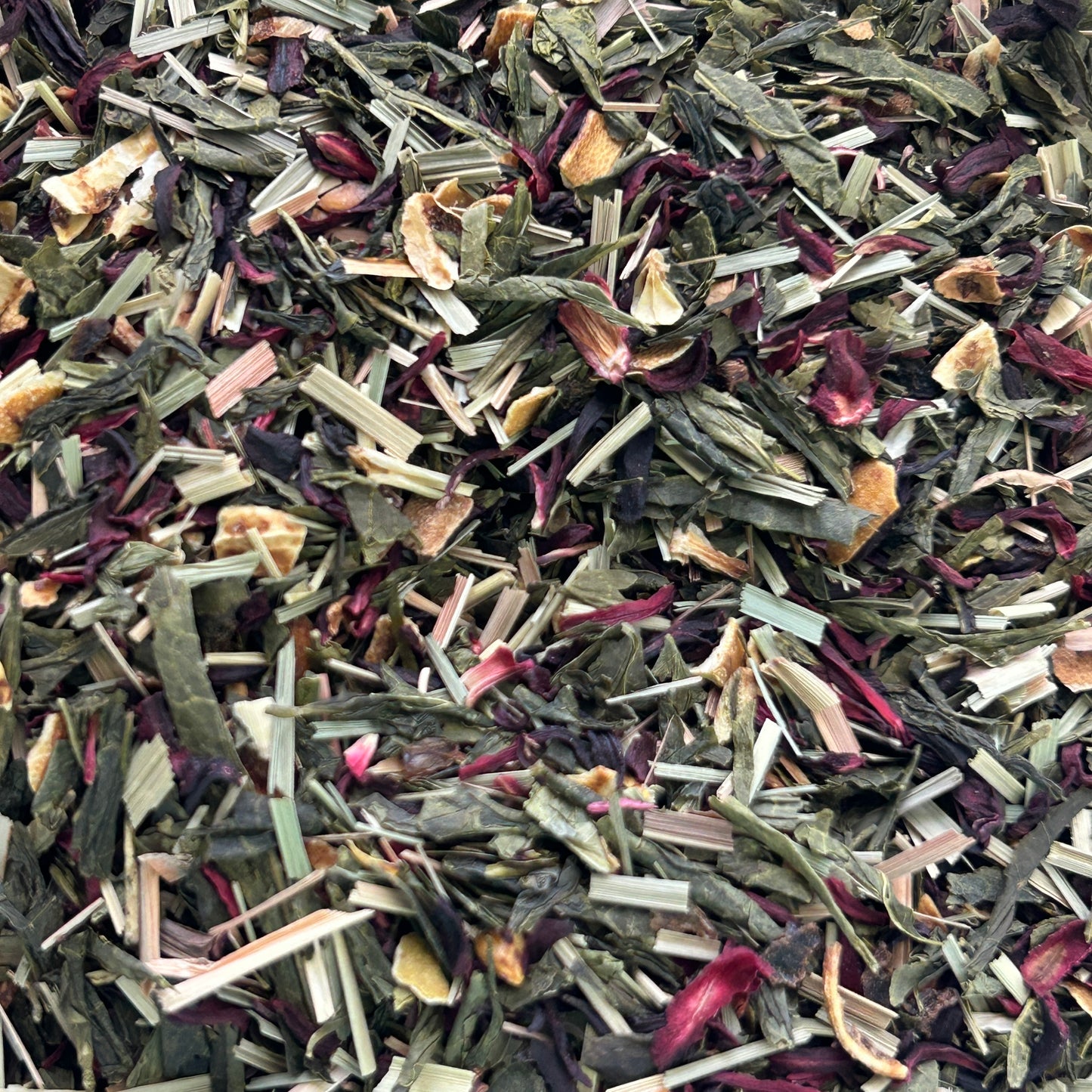 Green Citrus Hibiscus green tea with bright red hibiscus petals