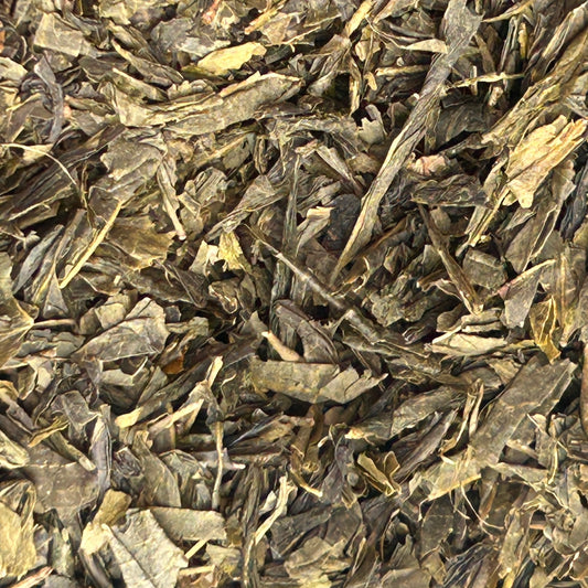 Loose leaf green tea with vibrant green leaves